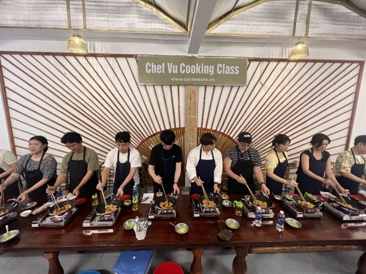 Chef Vu Cooking Class with Market Tour and Cyclo Ride - main image